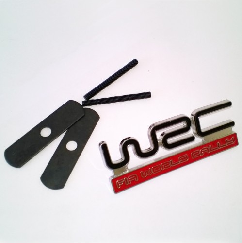 картинка Шильдик в решетку радиатора с логотипом "Nissan" магазин  StreetTuning 