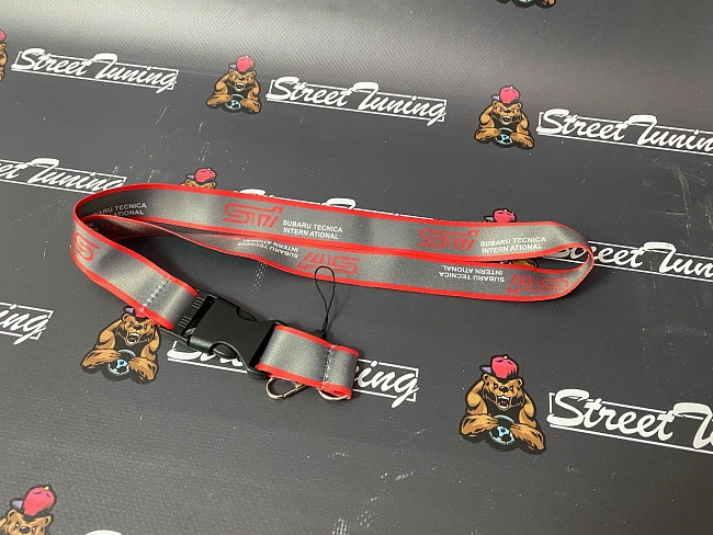 картинка Шнурок для ключей STI "тканевый", серый магазин  StreetTuning 