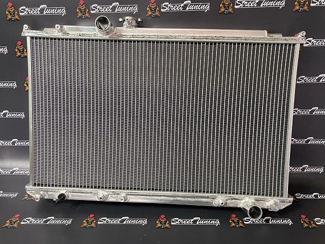 картинка Радиатор алюминиевый Toyota Mark JZX100 JZX110 1JZ-GTE 50мм AT STREETTUNING магазин  StreetTuning 