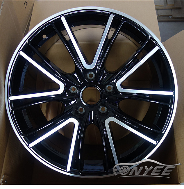 картинка Новые диски Porsche Exclusive Design Black R20 5X112 ET19 J9 черный глянец + серебро магазин  StreetTuning 