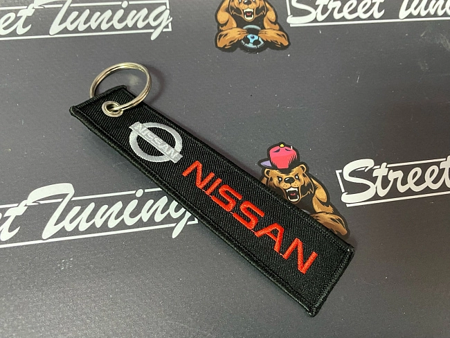 картинка Брелок для ключей Nissan "тканевый", черный магазин  StreetTuning 