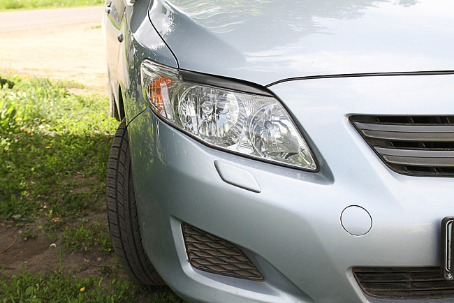 картинка Toyota Corolla Sd 2007—2010 Накладки на фары (реснички) компл.-2 шт. магазин  StreetTuning 