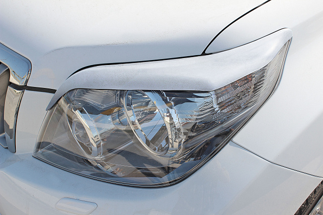 картинка Toyota LC Prado 150 2009—2013 Накладки на фары (реснички) компл.-2 шт. магазин  StreetTuning 