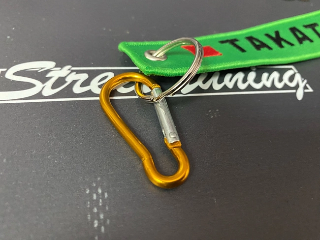 картинка Брелок для ключей TAKATA "тканевый", зеленый магазин  StreetTuning 