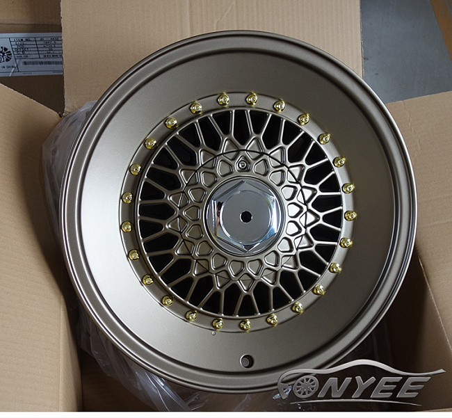картинка Новые диски BBS RS R16 4X100/4X108 ET30 J7 темно золотой глянец + золотые болтики + полированная полка магазин  StreetTuning 