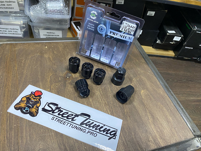 картинка Комплект секретных гаек Starleks шаг M12x1,5 33 мм, черные (Ford) магазин  StreetTuning 