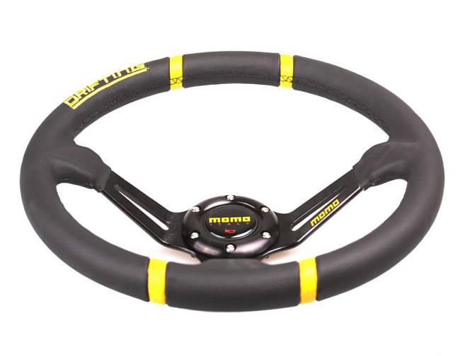 картинка Спортивный руль MOMO Style, кожаный с желтыми вставками магазин  StreetTuning 