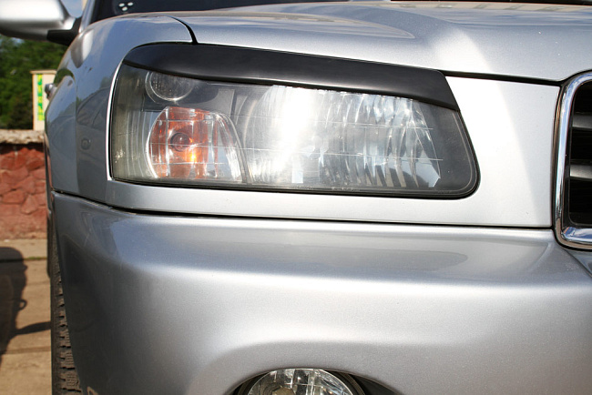 картинка Subaru Forester 2002—2005 Накладки на передние фары (реснички) компл.-2 шт. магазин  StreetTuning 