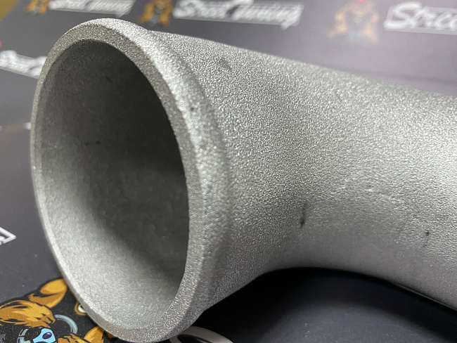 картинка Отвод алюминиевый приварной 90 гр 63 - 76 мм магазин  StreetTuning 