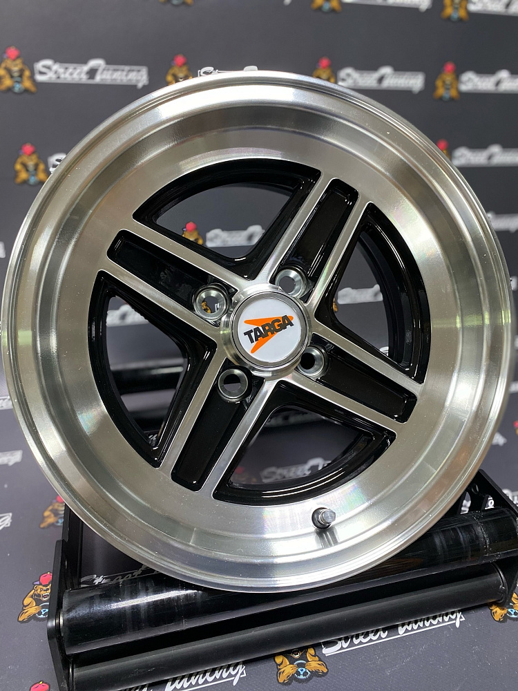 картинка Новые диски Enkei Wheels 471 R13 J7 ET7 4x98 Black + Silver от магазина  StreetTuning