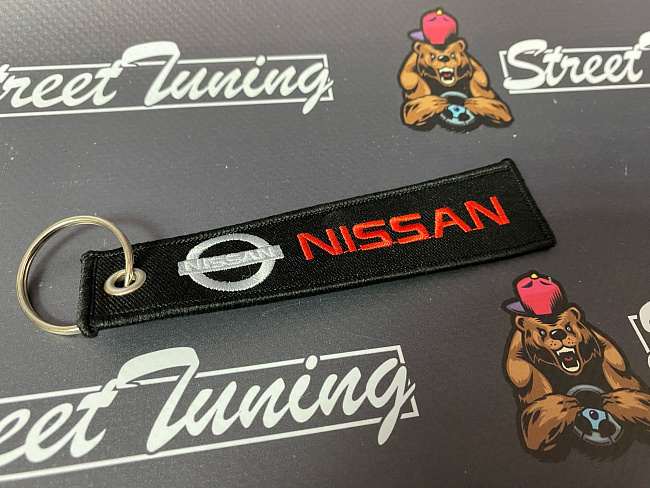 картинка Брелок для ключей Nissan "тканевый", черный магазин  StreetTuning 