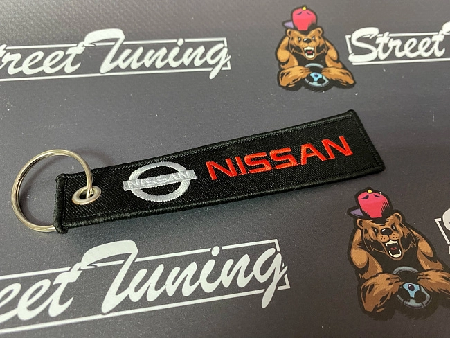 картинка Брелок для ключей Nissan "тканевый", черный магазин  StreetTuning 